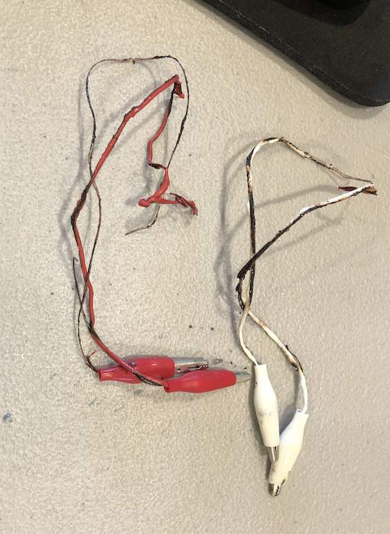 Burnt wires from an accidental short.